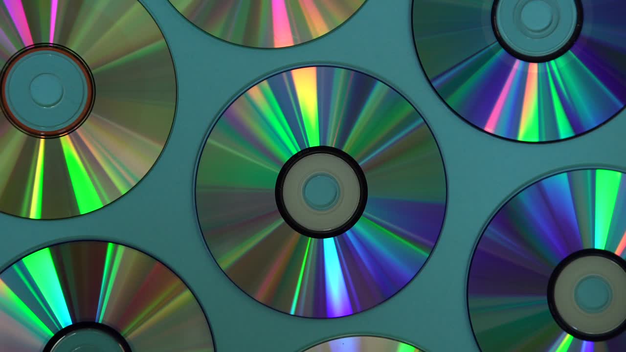 Vintage CD or DVD disk background, old circle discs used for data storage, share movies and music