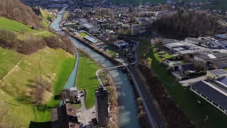 rolling mill, linth river and beautiful swiss city between alps at spring season