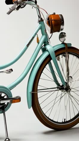 vintage-style mint bicycle with brown accents and a retro design