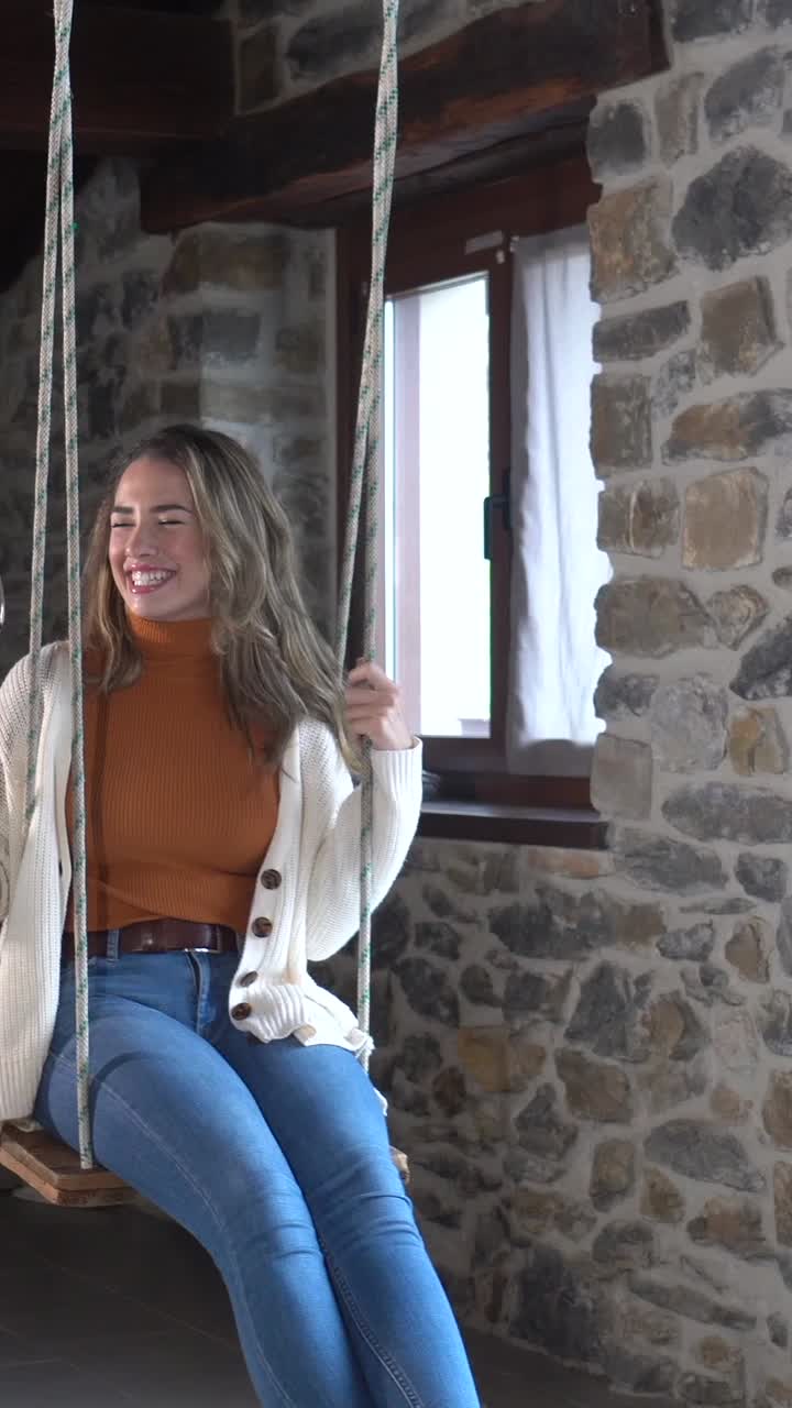 Woman Enjoying Red Wine on a Swing