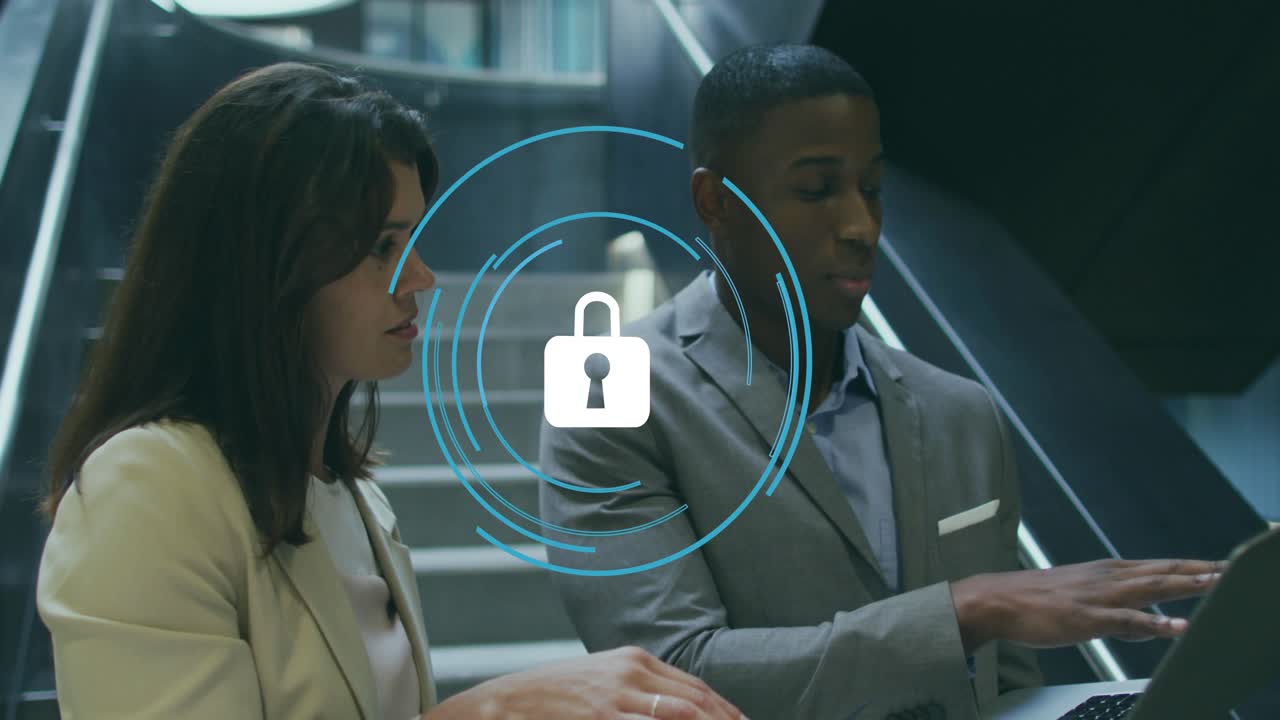 Woman tapping keypad making lock icon pulse, colleague showing smartphone, typing laptop for login