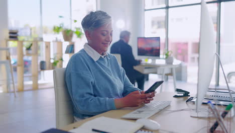 Phone,-chatting-and-happy-senior-woman-in-office