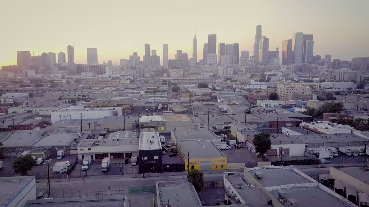 Hazy Urban Skyline with Industrial Foreground