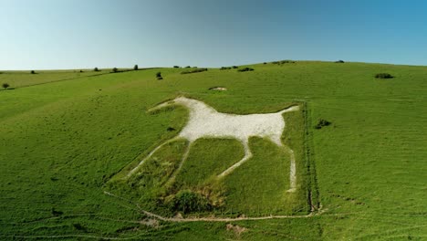 alton barnes iconic white horse hillside carving chalk figure landmark aerial view rising above english landscape