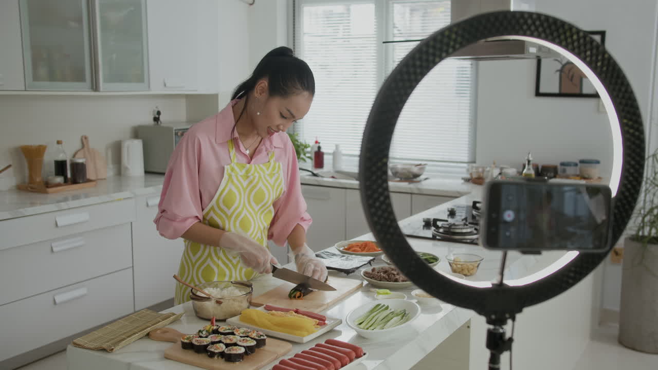Asian Girl Vlogging when Preparing Gimbap at Home