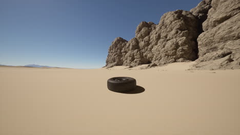 a lone tire in the desert