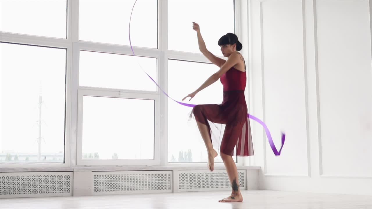 Woman Ribbon Dancer in Studio
