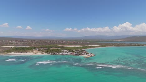 sliding right aerial view of hellshire with portmore city in background