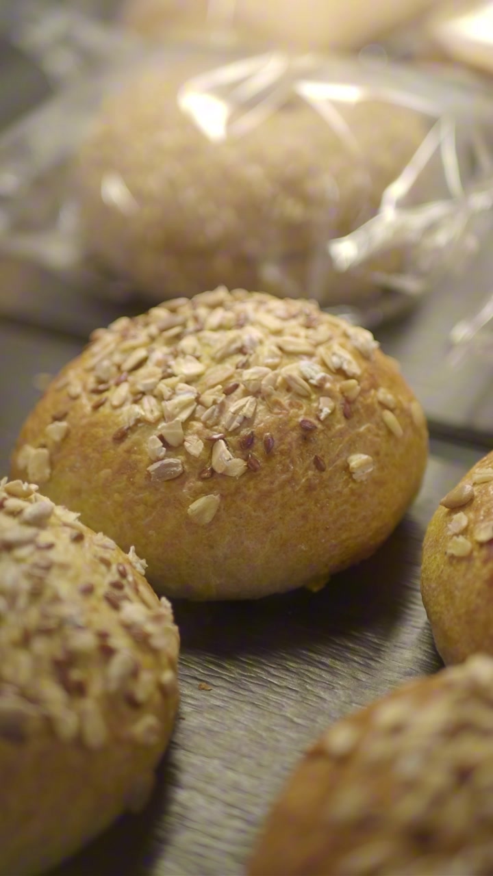Close-up of Freshly Baked Golden Seeded Bread Rolls