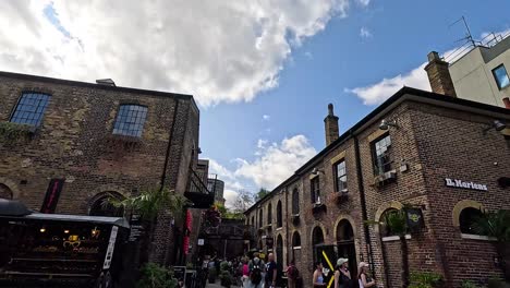 people walking in camden town, london