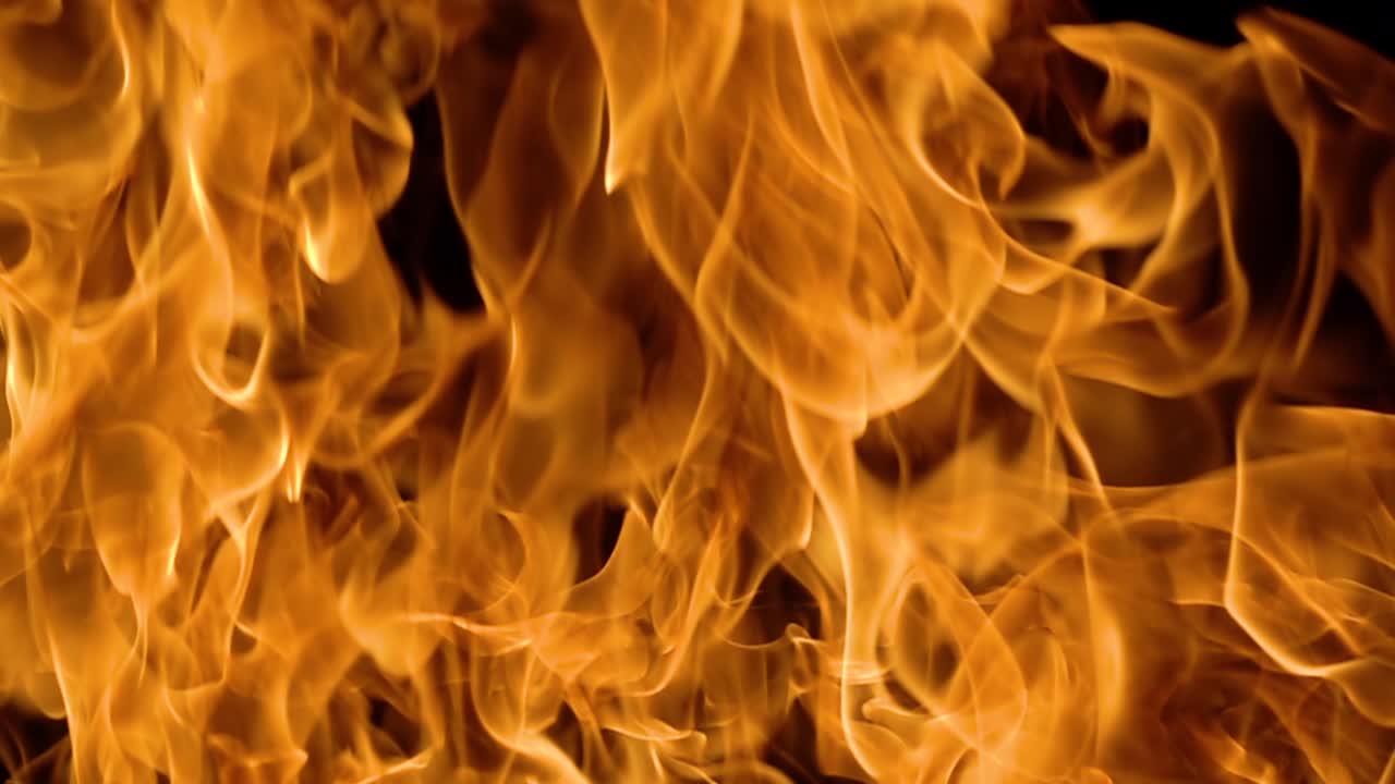 Flames of fire on black background in slow motion