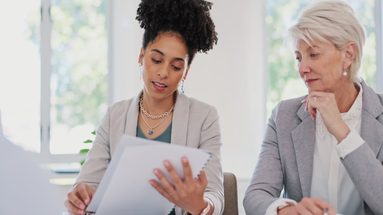 Teamwork, documents and women in business meeting