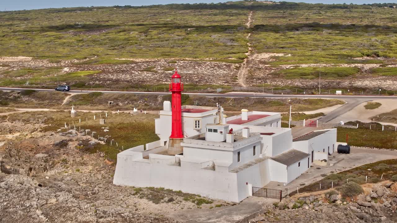 Exploring the lighthouse in Portugal near the coast during daylight