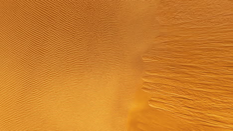 stunning aerial view of gran canaria's golden sand dunes at sunset