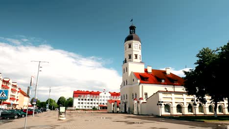 nesvizh, belarus. square and town hall in summer sunny day. famous landmark in nyasvizh. architecture of 16th century. zoom, zoom out