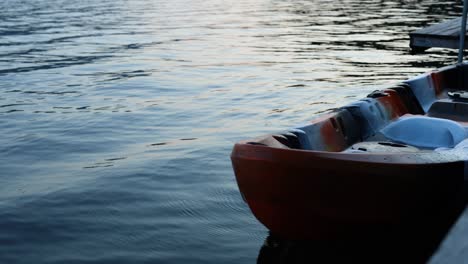 a serene sequence of a boat floating on a lake