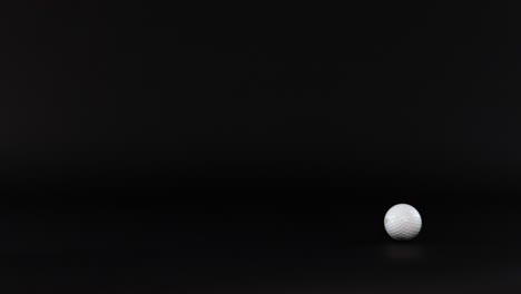 a golf ball moves across a dark background