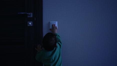 baby exploring a room at night