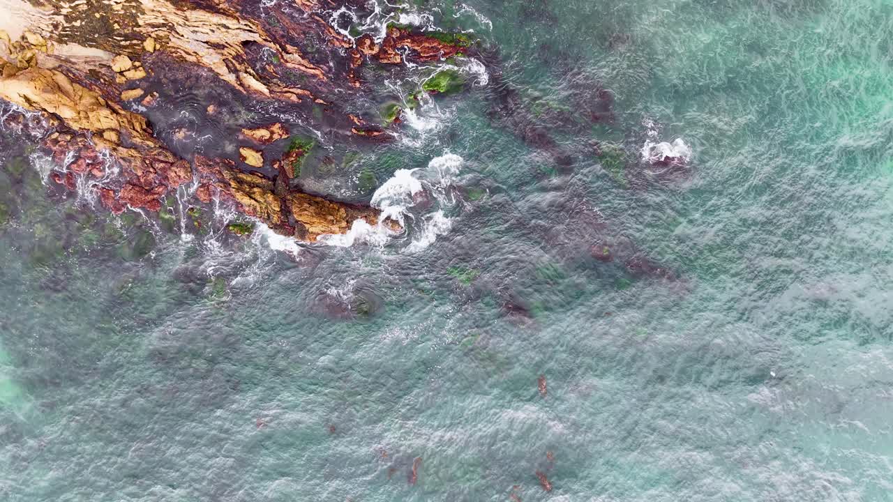 line, ocean surf, drone coastal view, crashing waves, shoreline rocks, California coast,