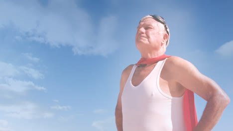 animation of glowing light over senior man dressed as superhero outdoors