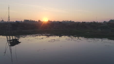 sunrise over the serene lake
