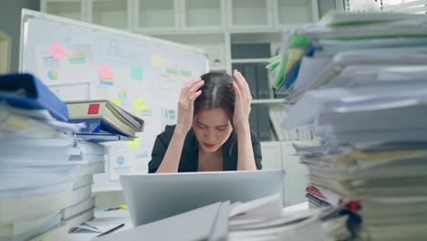 overwhelmed woman in office