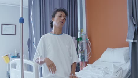 female patient sitting on a hospital bed