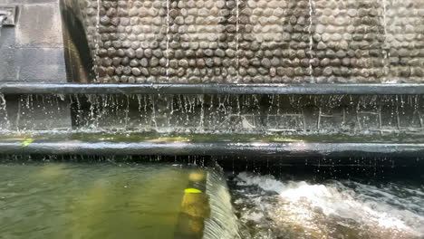 rainwater flowing in the mexico city aqueduct towards mexico city in very slow motion