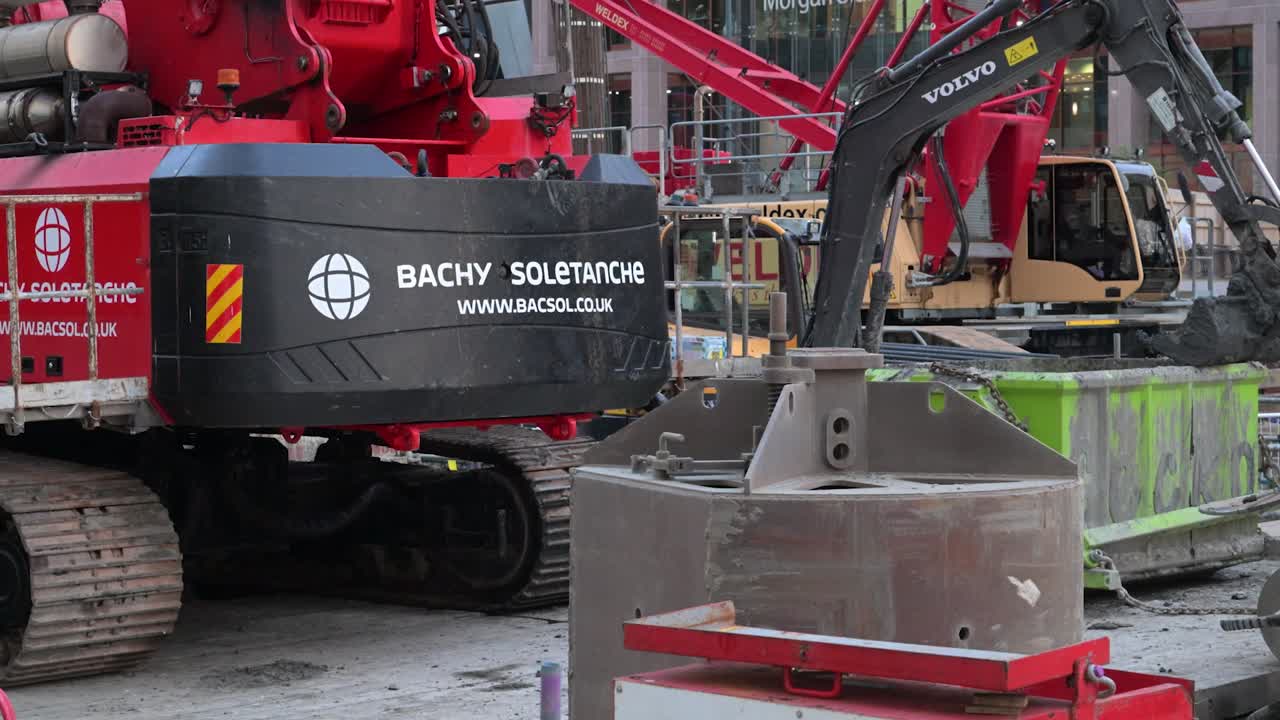 Construction Site with Heavy Machinery and Excavators