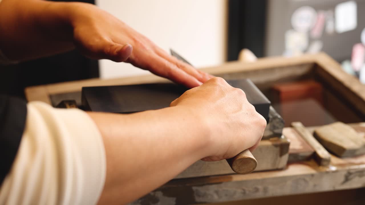 Step-by-step process of sharpening a knife