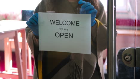 store reopening sign