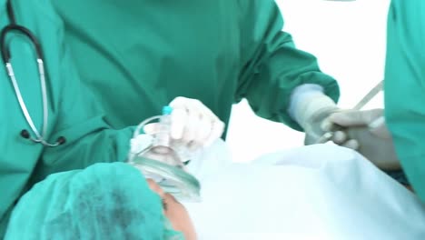 close up of surgeons operating on a patient