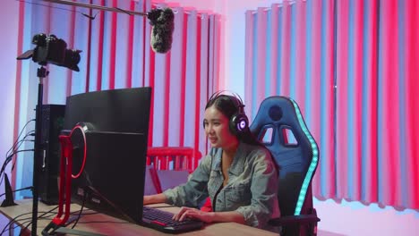 Young Streamer Girl Playing Video Game On Computer