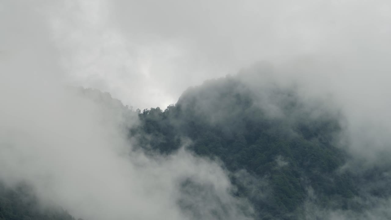 Clouds Timelapse over Mountains Forest in Nepal, Himalayas Time Lapse of Cloud Rolling Quickly Over Tropical Rainforest Trees Scenery in the Himalayas Mountains Landscape in Annapurna Trekking Region