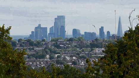 distant view of iconic buildings of the city of london from alexandra palace in united kingdom at daytime