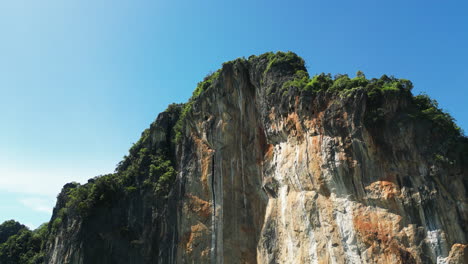Aerial-close-of-limestone-cliffs-rock-formation-in-Railay-beach