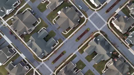 affluent area with high-end villas in american luxury living community. aerial top down flyover. new developed neighborhood in usa. exclusive suburb estates.