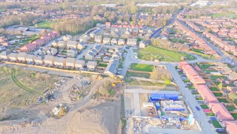 aerial pull-out view of residential development and construction site in lundhill, wombwell