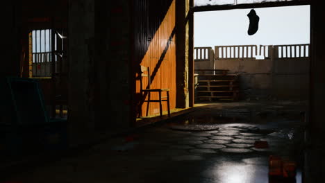 abandoned industrial interior with sunlight and shadows