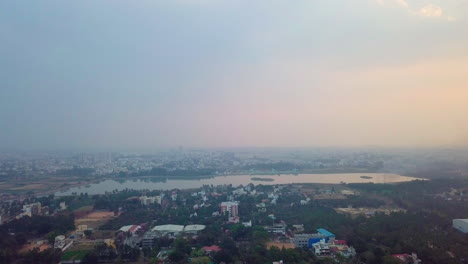 aerial view of a city with a lake
