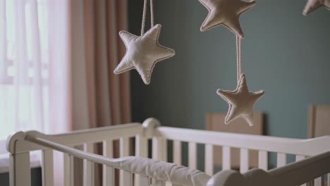 baby crib with hanging star mobile