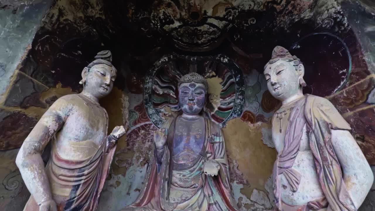 Ancient Sculptures From The Maijishan Grottoes, UNESCO World Heritage Site In Tianshui, Gansu Province, China. Tilt-up Shot