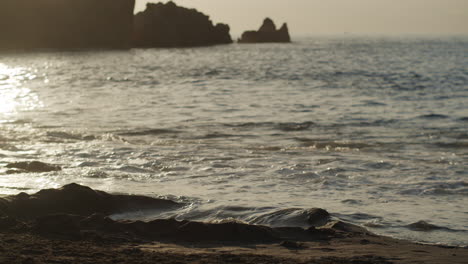 A-closeup-of-waves-foaming-in-the-evening-light