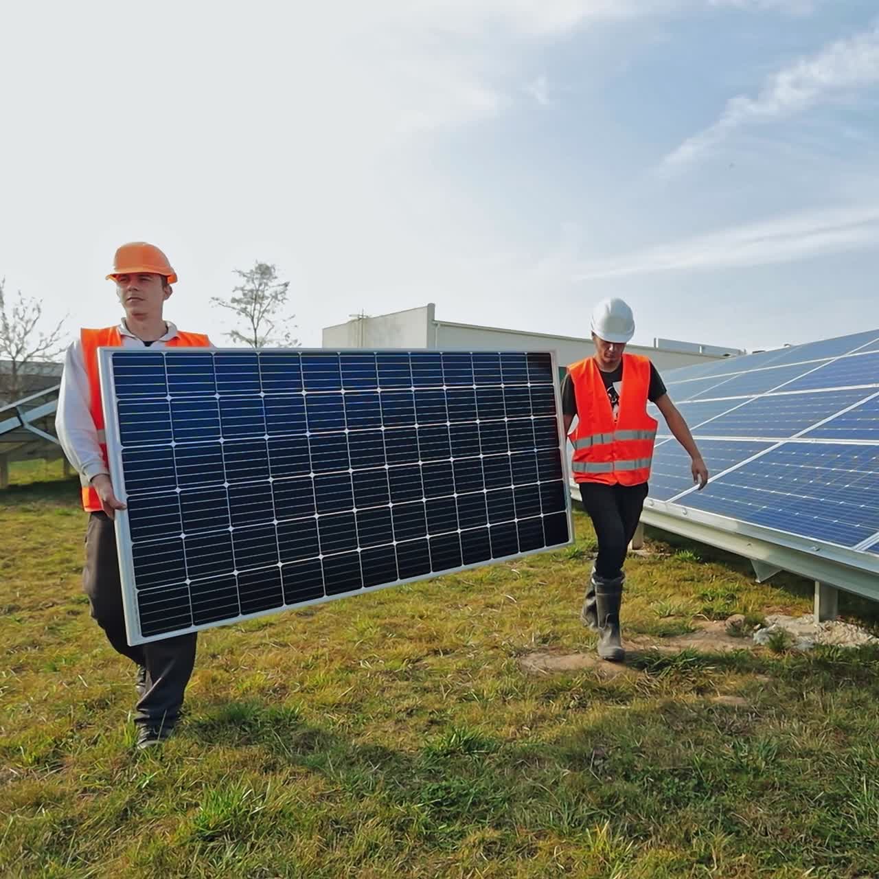Man working at solar power station