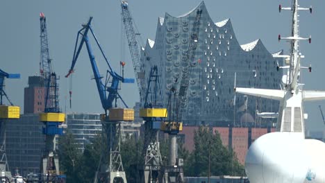 opera elbphilharmonie with loadingcranes, harbour of hamburg, 4k