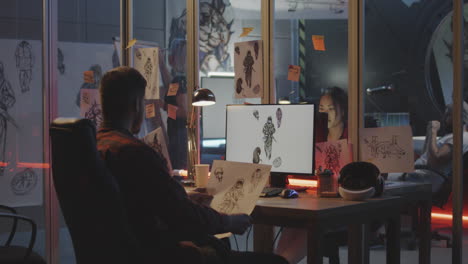 game design team working on concept art