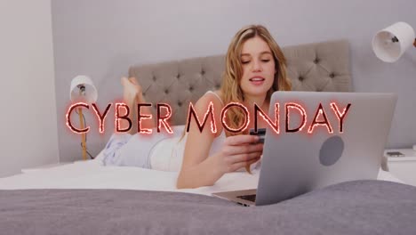 animation of cyber monday over happy caucasisn woman doing online shopping