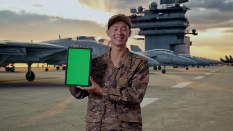 military personnel with tablet on aircraft carrier