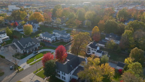 aerial over nice houses in kirkwood neighborhood at sunset