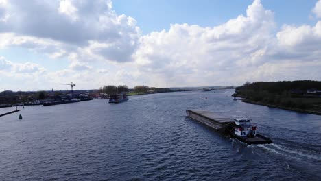 crigee freighters sail towards seaport in puttershoek, netherlands